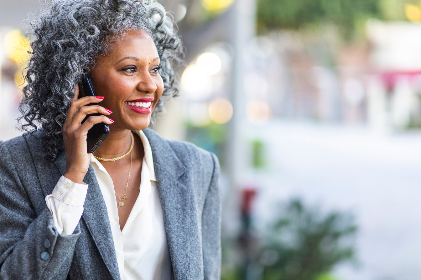 Middle-aged Businesswoman Talking on Her Phone 